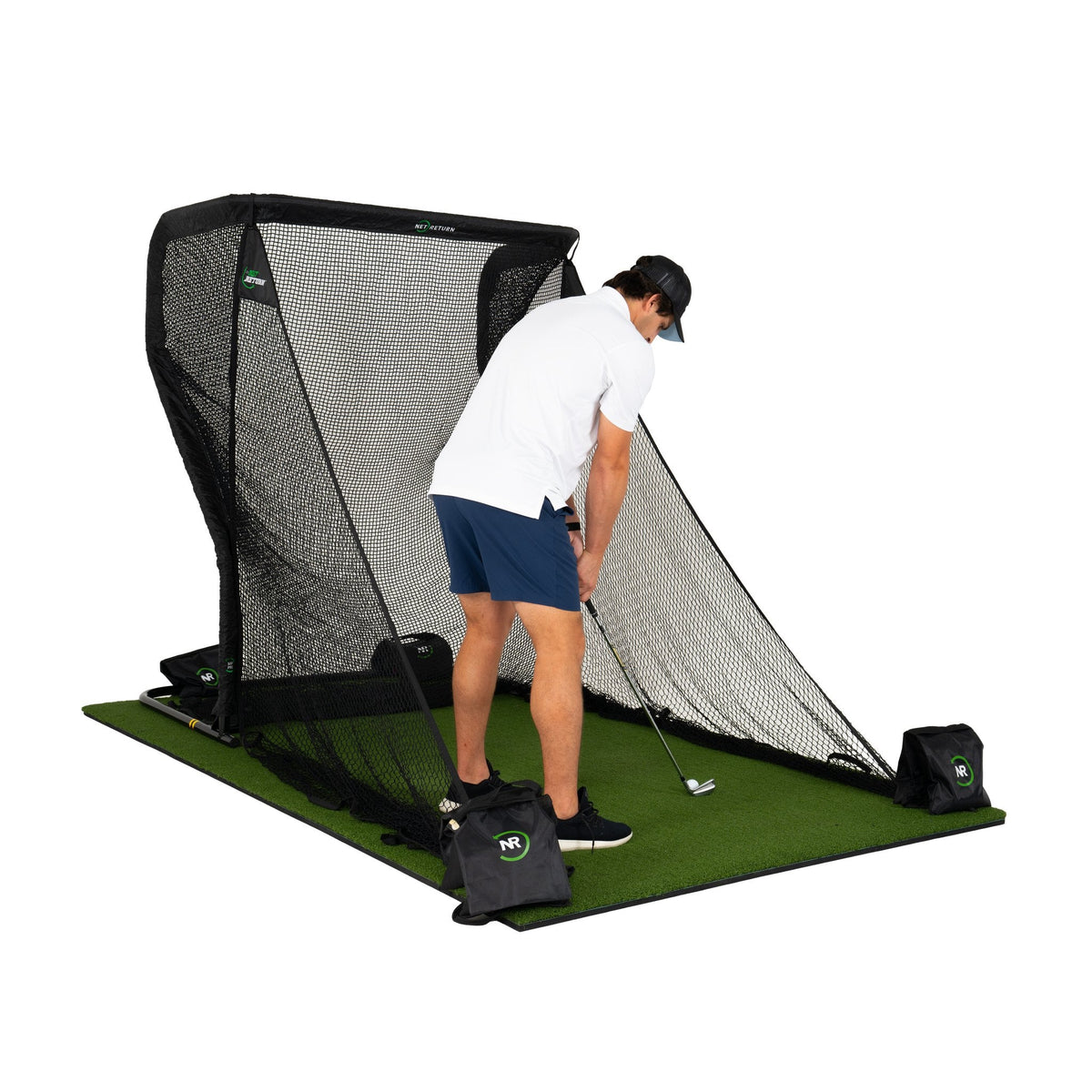 The Net Return MiniPro golf net with turf, set up outdoors showing its compact design and sturdy construction for practice.