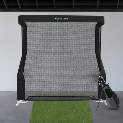 The Net Return Pro XL Golf Training Aid net set up outdoors, with a sturdy frame and large hitting area for golf practice.